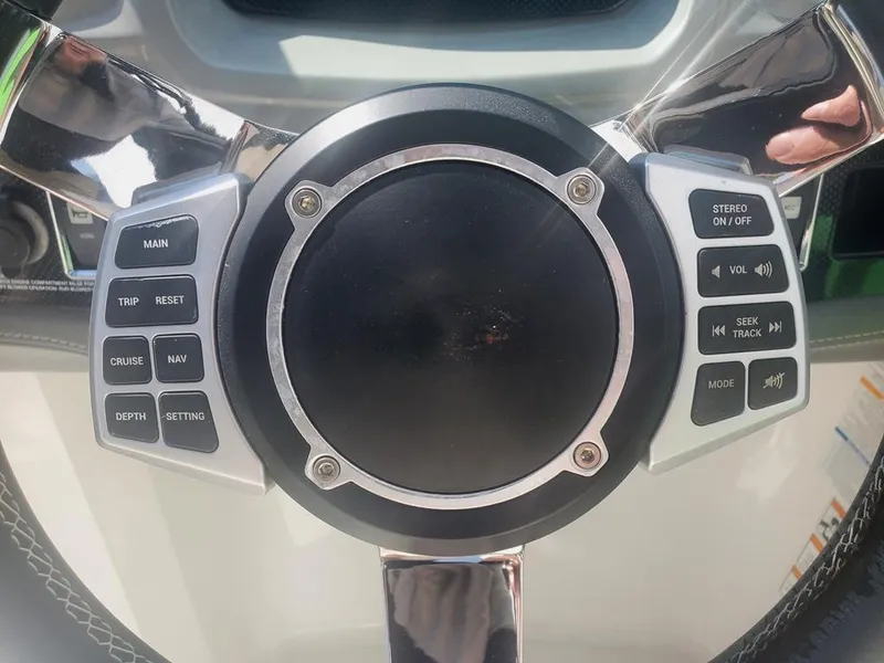 Slide: The Image of Steering wheel controls of 2017 Chaparral Vortex 243 VRX boat. - 12
