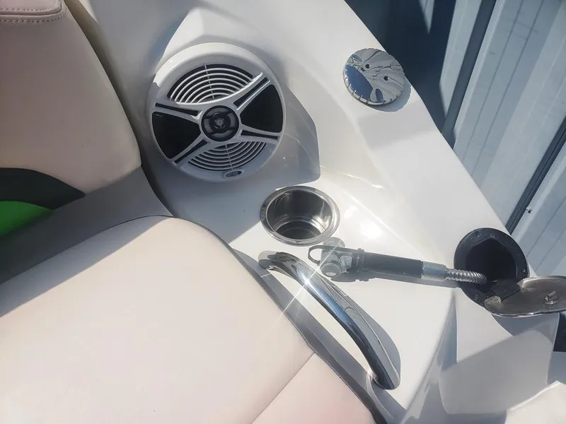 Slide: The Image of 2017 Chaparral Vortex 243 VRX boat interior with speaker and cup holder. - 18