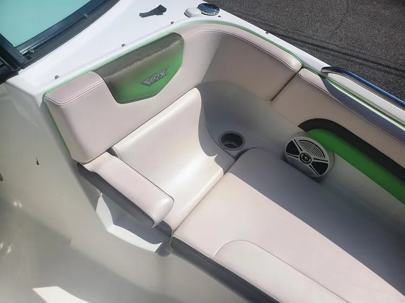 Slide: The Image of 2017 Chaparral Vortex 243 VRX boat interior with white and green seating. - 20