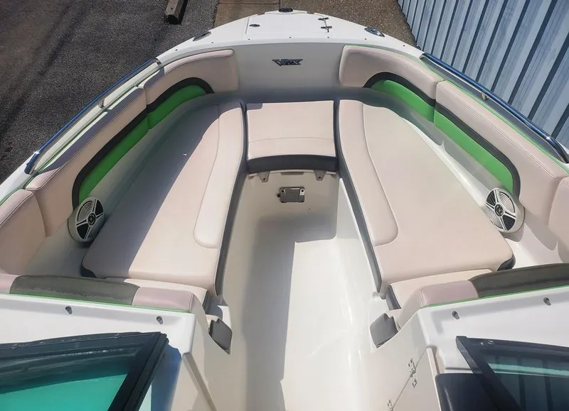 Slide: The Image of 2017 Chaparral Vortex 243 VRX boat interior with cushioned seating and speakers. - 5