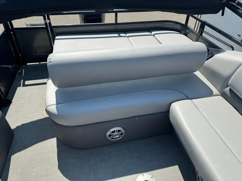 Slide: The Image of 2023 Regency 250 DL3 boat with sleek gray seating and modern design. - 15