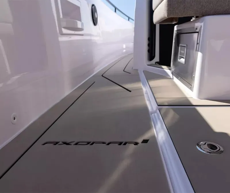 Slide: The Image of 2024 Axopar 37 Sun Top boat deck with sleek design and modern features. - 5
