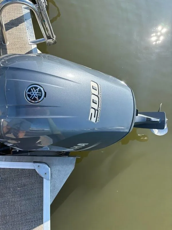 Slide: The Image of Yamaha 200 outboard motor on 2021 Barletta C24UC pontoon boat. - 10
