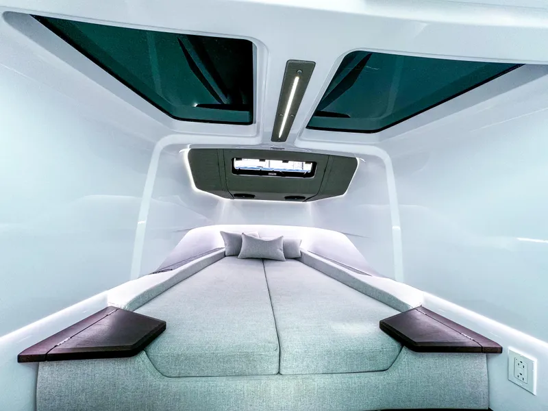 Slide: The Image of Luxurious interior cabin of 2024 Axopar 37 Sun Top with modern design and skylights. - 15