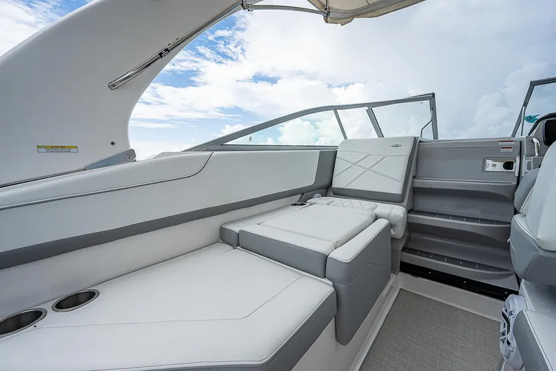 Slide: The Image of 2022 Regal 26 XO boat interior with sleek seating and modern design. - 25