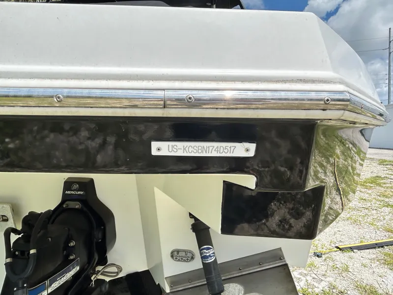 Slide: The Image of 2017 Cruisers Yachts 338 Sport Series boat stern with identification number. - 4
