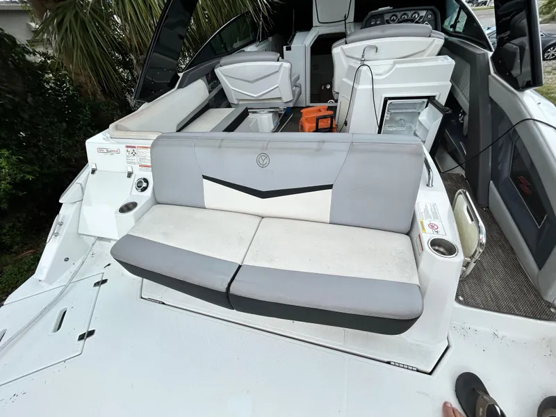 Slide: The Image of 2017 Cruisers Yachts 338 Sport Series interior with gray seating and modern design. - 8