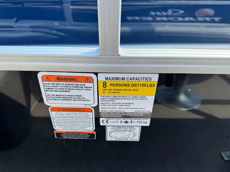 Slide: The Image of Warning labels on 2025 Sun Tracker Party Barge 16 DLX, capacity 8 persons or 1150 lbs. - 10