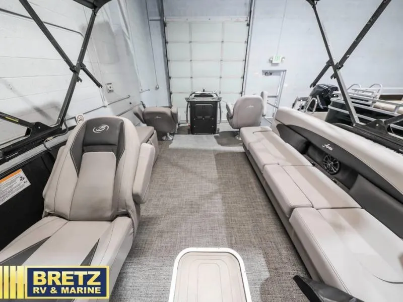 Slide: The Image of Interior of 2025 Aria Cast-N-Cruise A22CC boat with spacious seating. - 9