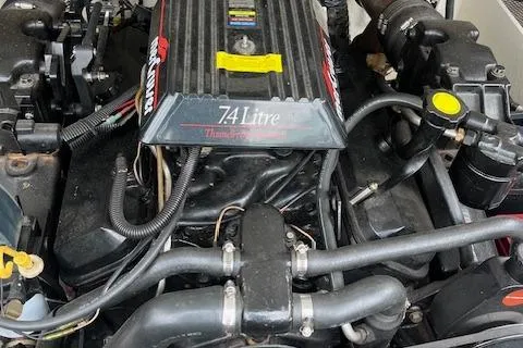 Slide: The Image of 1996 Cobalt 232 engine, 7.4 Litre, detailed view of components and hoses. - 10