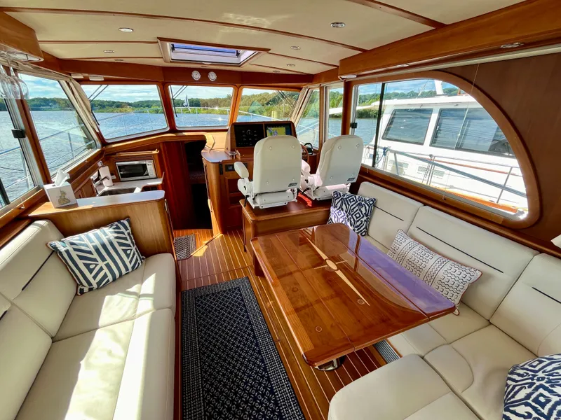 Slide: The Image of Luxurious interior of 2018 Sabre 45 Salon Express yacht with elegant seating and wood finishes. - 28