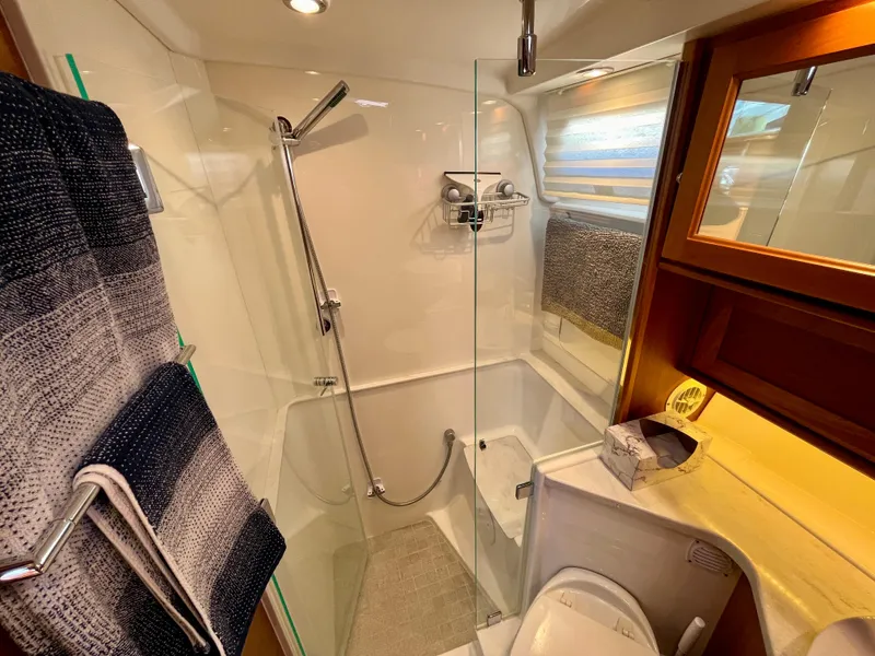 Slide: The Image of Luxurious bathroom in 2018 Sabre 45 Salon Express yacht with modern shower and elegant fixtures. - 47