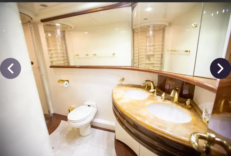 Slide: The Image of Luxurious bathroom in 2003 Azimut 74 Solar yacht with dual sinks and elegant fixtures. - 13