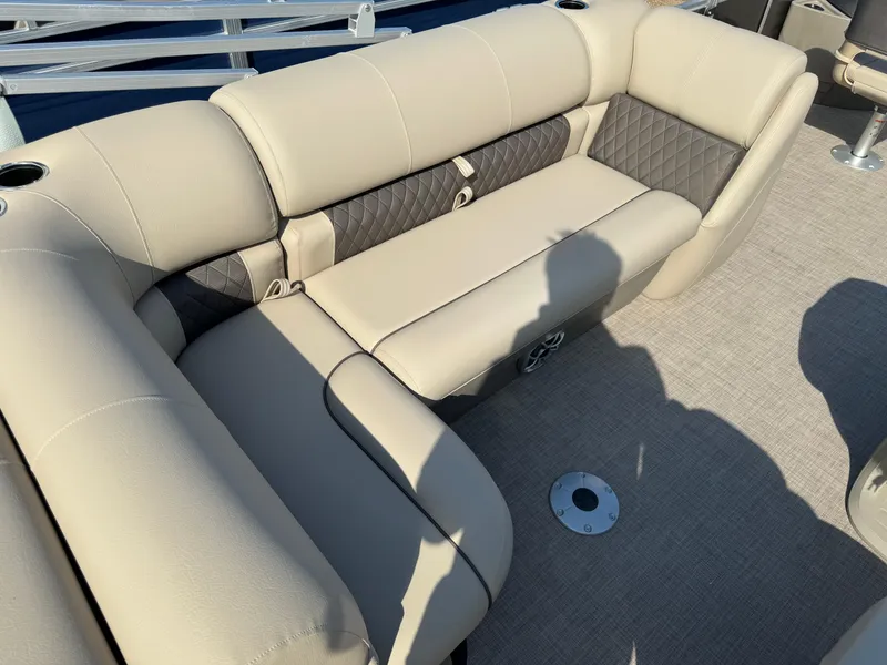 Slide: The Image of 2025 Sun Tracker Fishin' Barge 20 DLX, beige seating, spacious and comfortable layout. - 17