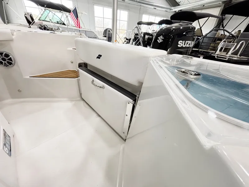 Slide: The Image of Interior view of Starcraft SVX 231 OB CC boat, model year 2025. - 17