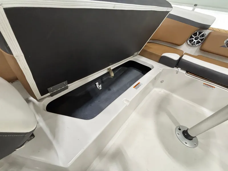 Slide: The Image of Storage compartment in Starcraft SVX 231 OB CC boat, 2025 model. - 21