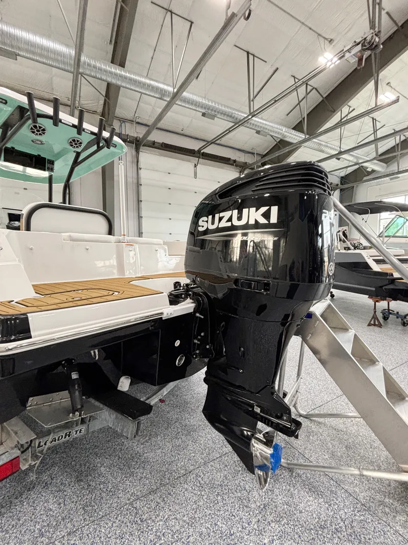 Slide: The Image of 2025 Starcraft SVX 231 OB CC with Suzuki outboard motor. - 23