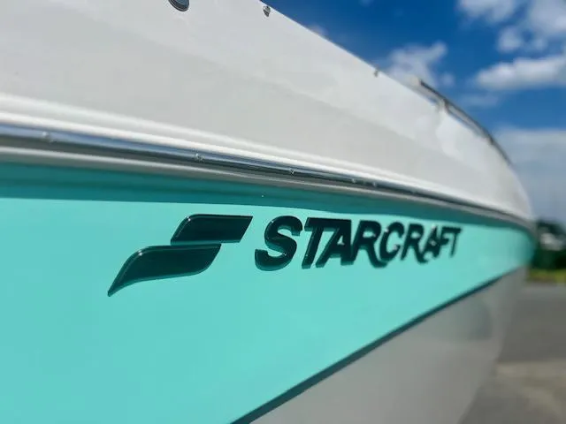 Slide: The Image of 2025 Starcraft SVX 231 OB CC helm with modern controls. - 4