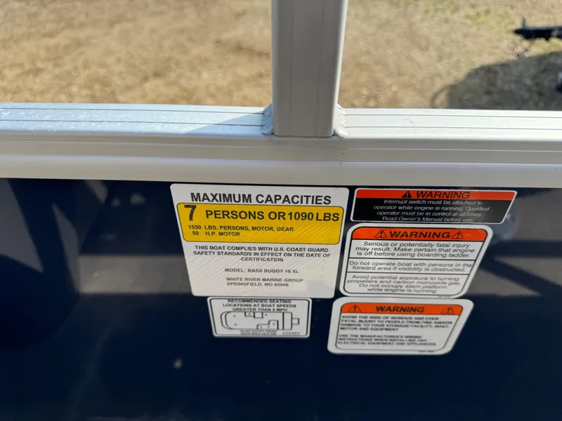 Slide: The Image of 2024 Sun Tracker Bass Buggy 16 XL Select capacity label, 7 persons or 1090 lbs. - 13