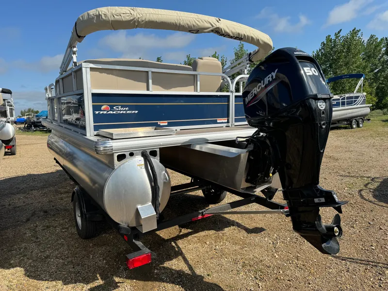 Slide: The Image of 2024 Sun Tracker Bass Buggy 16 XL Select pontoon boat with Mercury 50 engine. - 4