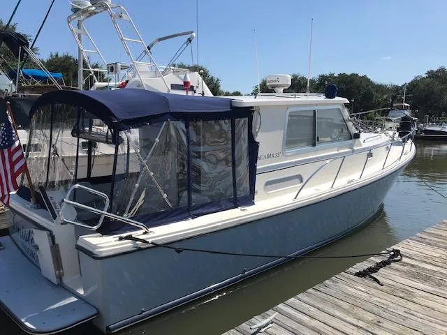 The Image of Atlas Boat Works Acadia 32, 2004 model, docked at marina. - 0