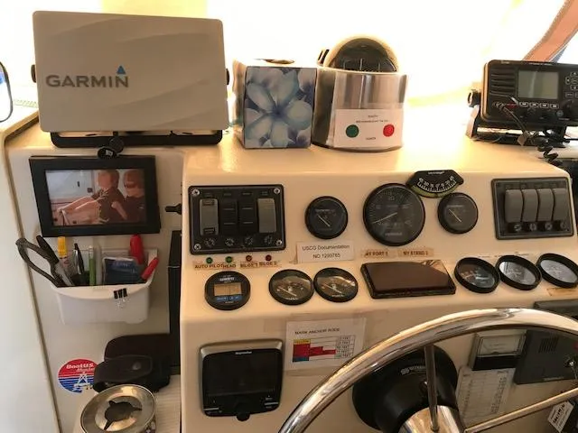 Slide: The Image of Atlas Boat Works Acadia 32 helm console, 2004 model. - 14