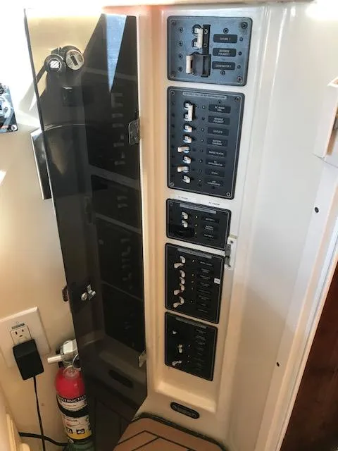 Slide: The Image of Electrical control panel of Atlas Boat Works Acadia 32, year 2004. - 15