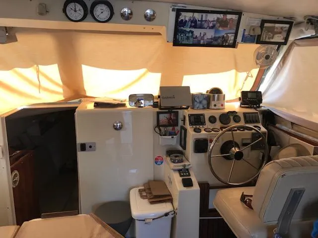 Slide: The Image of Interior of a 2004 Atlas Boat Works Acadia 32 with helm station. - 12