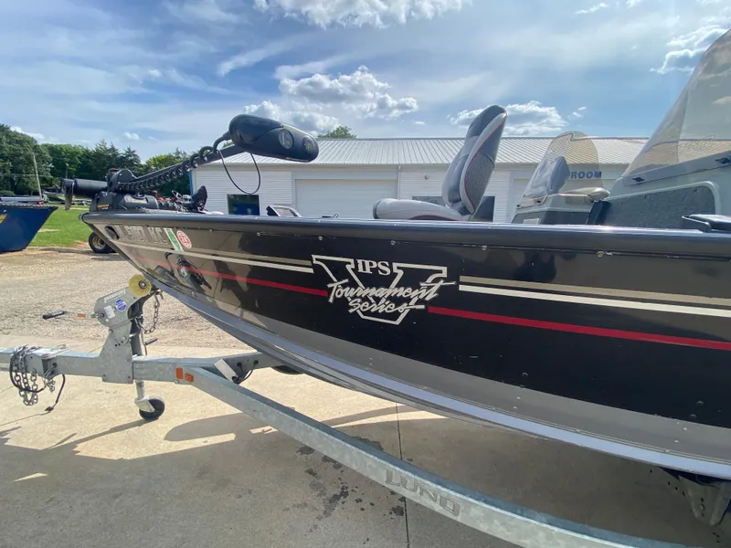 Slide: The Image of 2007 Lund 1900 Pro V SE boat on trailer, dual console, sunny day. - 14