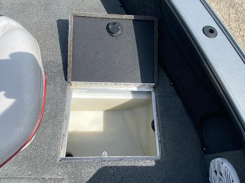 Slide: The Image of Open storage compartment on 2007 Lund 1900 Pro V SE boat. - 20