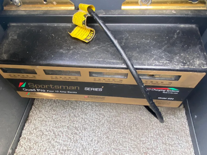 Slide: The Image of Sportsman Series Quad Pro battery charger in 2007 Lund 1900 Pro V SE boat. - 22