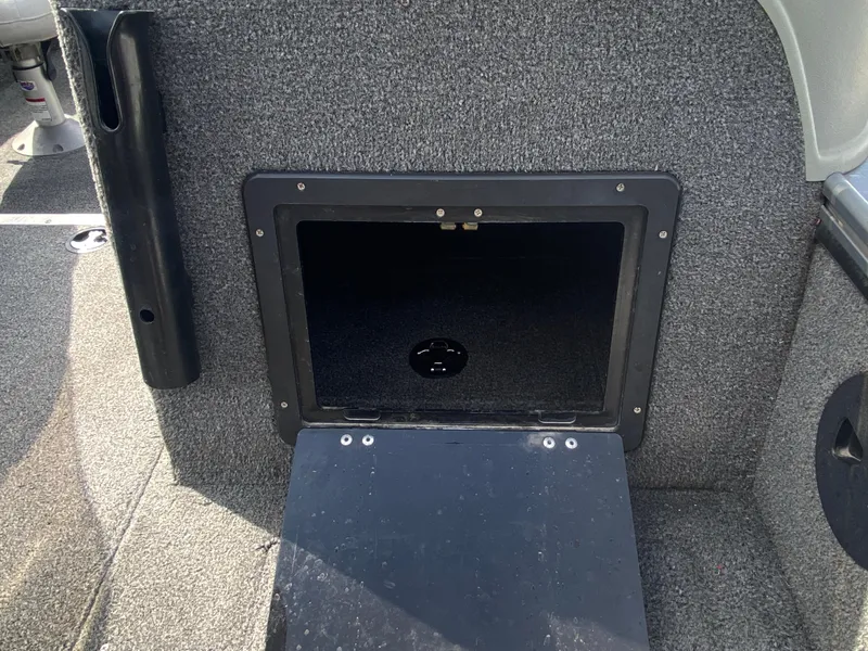 Slide: The Image of 2007 Lund 1900 Pro V SE boat storage compartment with open hatch. - 23