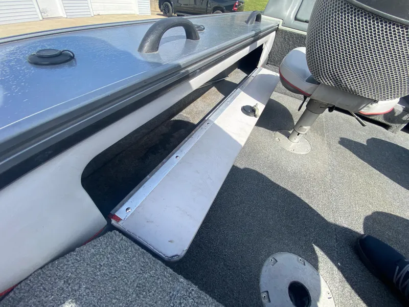 Slide: The Image of 2007 Lund 1900 Pro V SE boat interior with seating and storage compartment. - 35