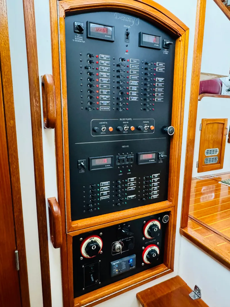Slide: The Image of Electrical control panel on a 2000 Holland 38 Downeast Cruiser boat. - 36