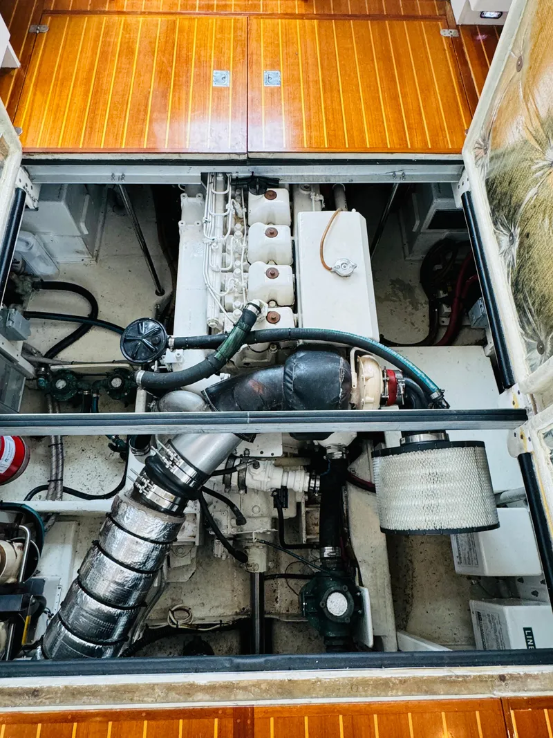 Slide: The Image of Engine compartment of 2000 Holland 38 Downeast Cruiser with wooden deck. - 43