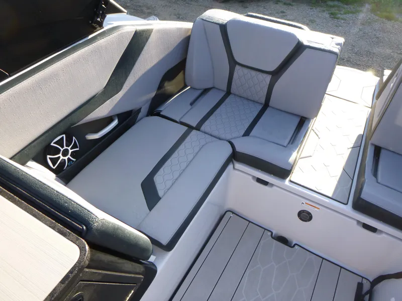 Slide: The Image of 2024 Yamaha Boats 255XE interior seating with modern design and premium upholstery. - 10