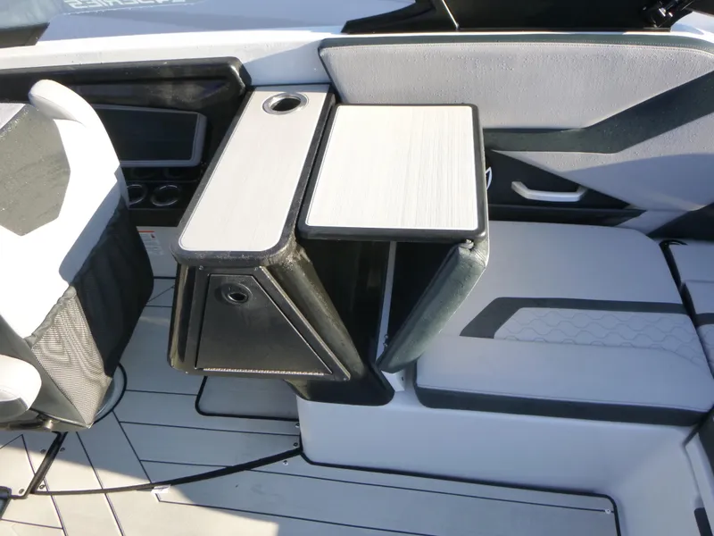 Slide: The Image of 2024 Yamaha Boats 255XE interior with sleek seating and modern design. - 11