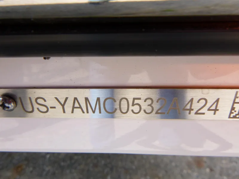 Slide: The Image of 2024 Yamaha Boats 255XE hull identification number plate. - 13