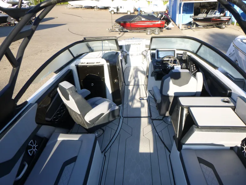 Slide: The Image of 2024 Yamaha Boats 255XE interior with modern seating and sleek design. - 5