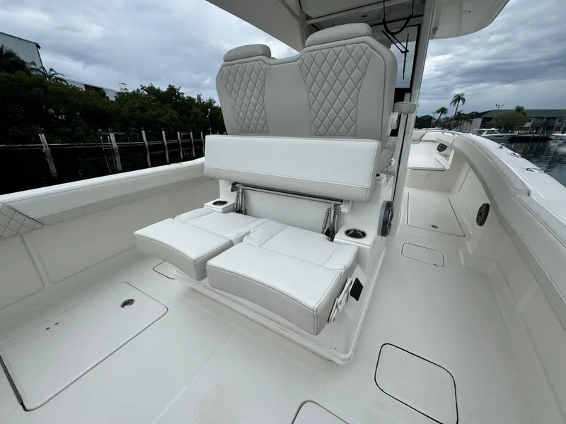 Slide: The Image of 2025 World Cat 280 CC-X boat interior with luxurious seating and modern design. - 11