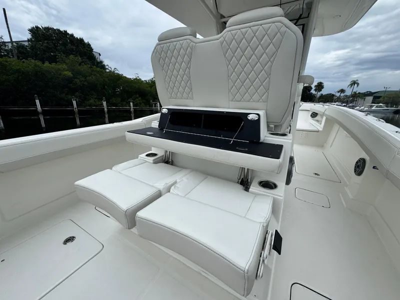 Slide: The Image of 2025 World Cat 280 CC-X boat with luxurious seating and sleek design. - 12
