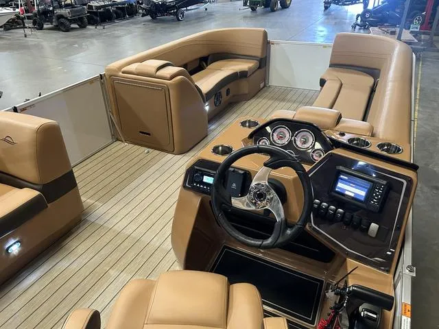 Slide: The Image of Luxurious 2025 SunCatcher Fusion 322C boat interior with Yamaha 200 "SHO" engine, featuring plush seating. - 15