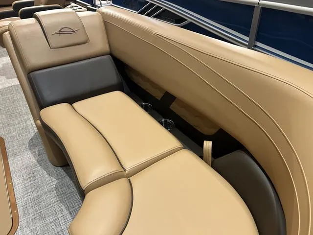 Slide: The Image of Luxurious tan leather seating in 2025 SunCatcher Fusion 322C boat interior. - 25