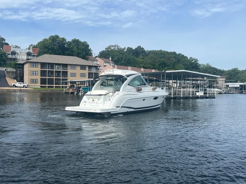 Slide: The Image of 2014 Formula 45 Yacht cruising near waterfront buildings and docks. - 16