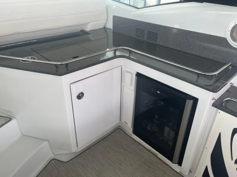Slide: The Image of Interior of 2014 Formula 45 Yacht with mini fridge and counter space. - 28