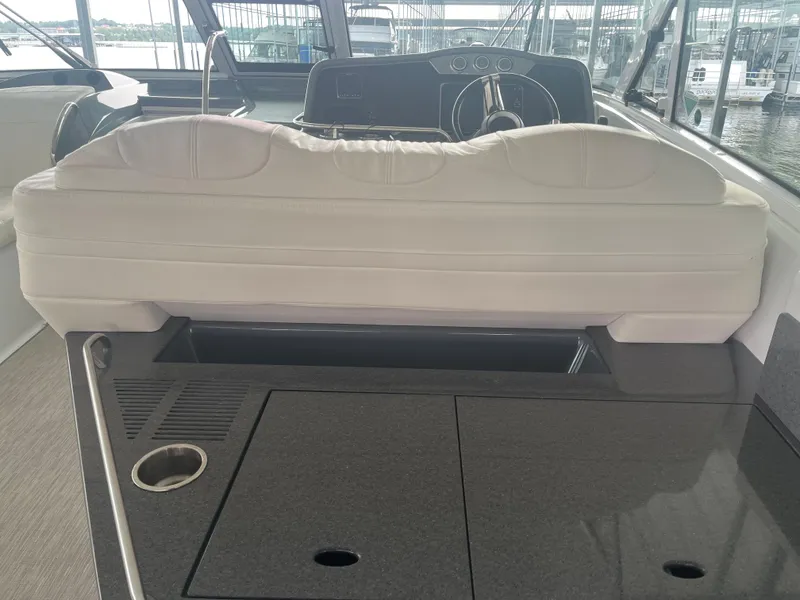 Slide: The Image of 2014 Formula 45 Yacht interior with white seating and sleek dashboard. - 29