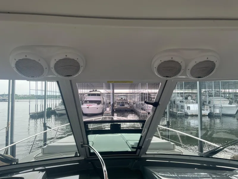 Slide: The Image of View from 2014 Formula 45 Yacht cockpit, overlooking marina with docked boats. - 33
