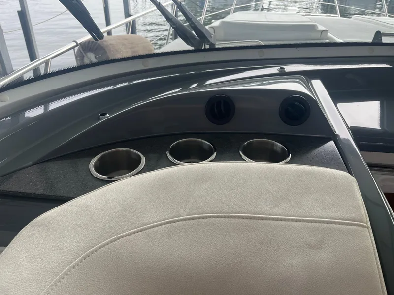 Slide: The Image of Interior view of 2014 Formula 45 Yacht dashboard with cup holders. - 34