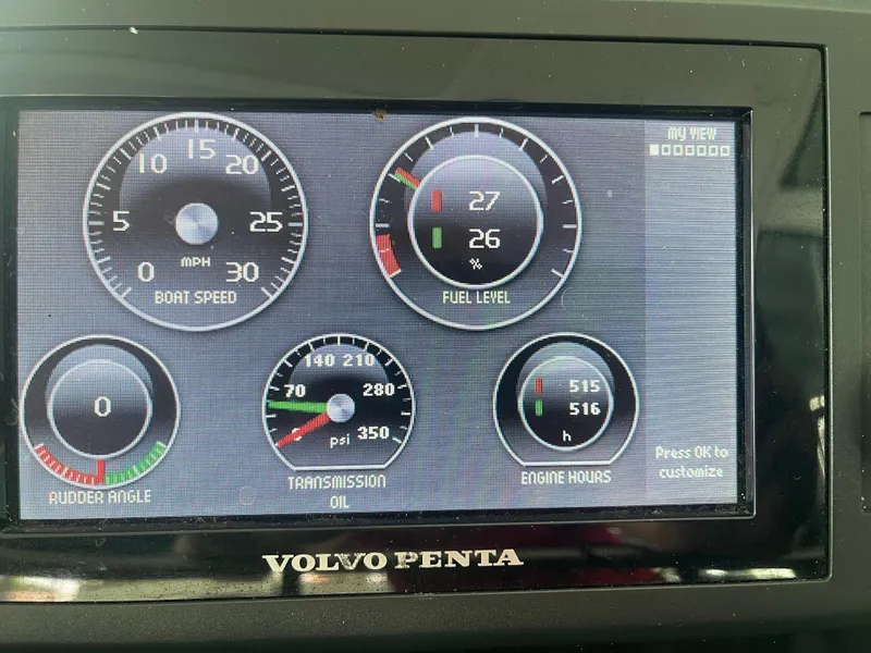 Slide: The Image of Volvo Penta dashboard displaying speed, fuel level, and engine hours on Formula 45 Yacht. - 38