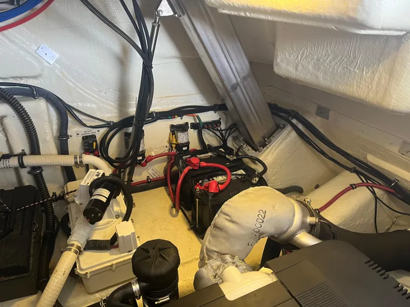 Slide: The Image of Engine room of 2014 Formula 45 Yacht with visible wiring and components. - 49
